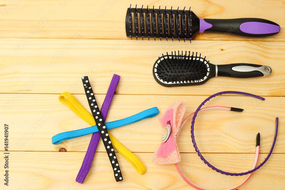 combs for hair on wood background combs for hair on wood background