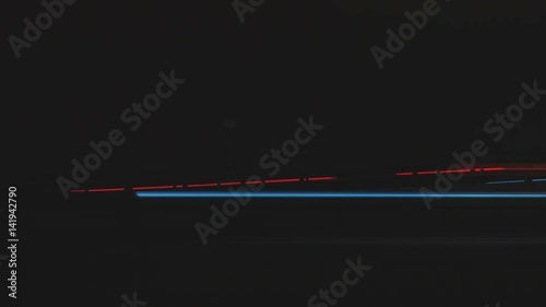 Super fast car lights in minimal style. Motion time lapse colorful urban background texture. Modern cityscape road traffic. Travel concept. Science hyperspeed  teleport movement. Time machine.