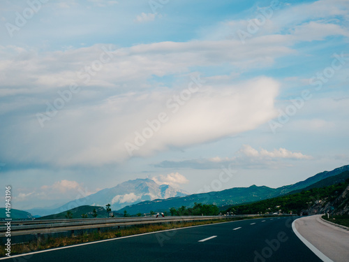 Highway. Motorway in Croatia. View of the car. The mountains and the horizon line at the background