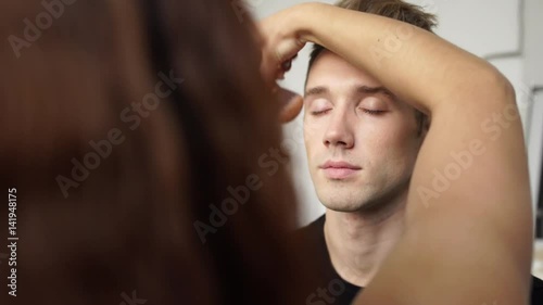 Wallpaper Mural Male model makeup for for the photo shoot in studio 4K Torontodigital.ca