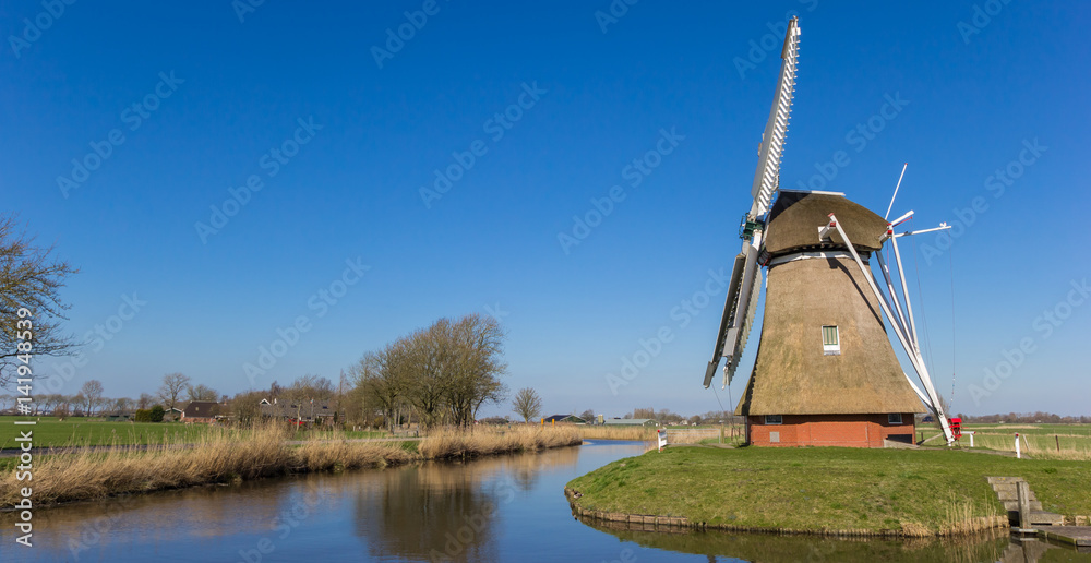 Panorama of a dutch windmill in Groningen