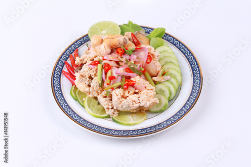 Spicy sour carp eggs of silver barb fish salad
