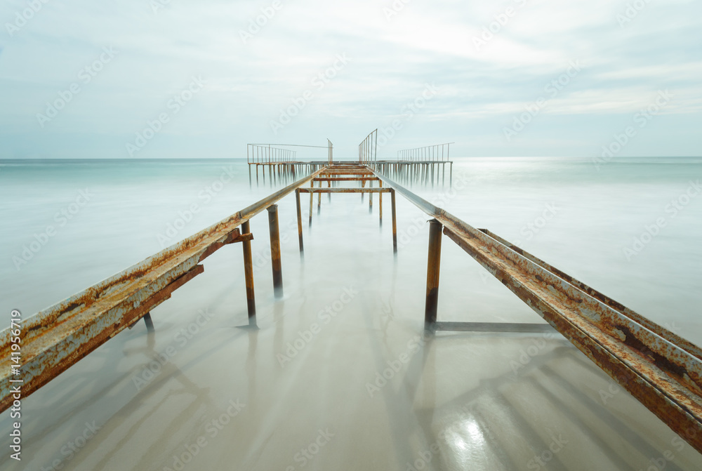 Old pier in blur