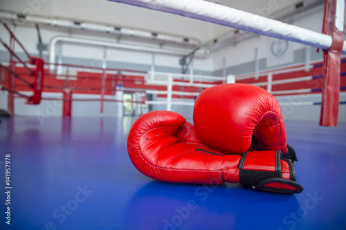 Boxing red gloves are in the ring. healthy lifestyle 