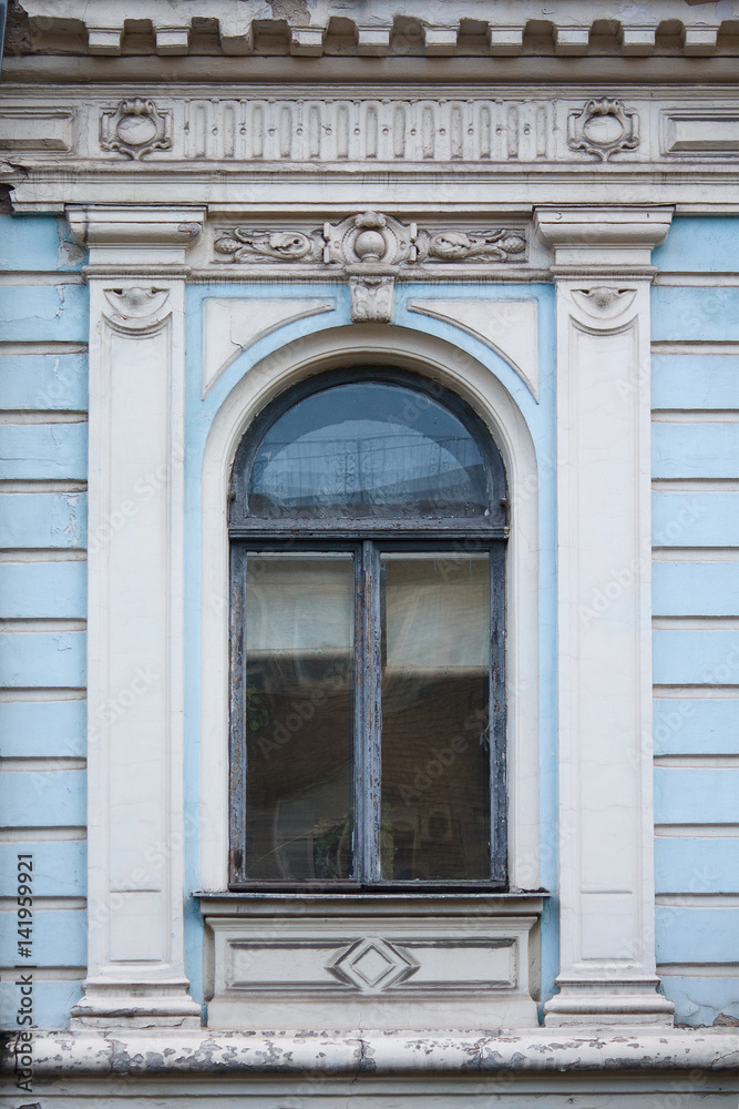 Old window in a classic style. Architecture Old window in a classic style. Architecture