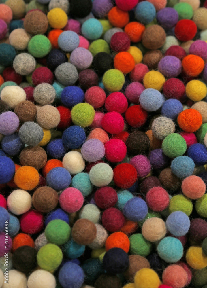 Close-up of multicolored felt small balls Close-up of multicolored felt small balls