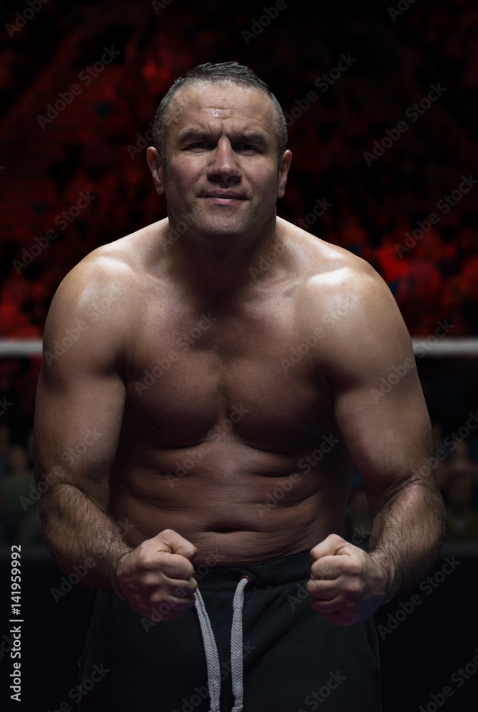 professional kickboxer in the training ring professional kickboxer in the training ring
