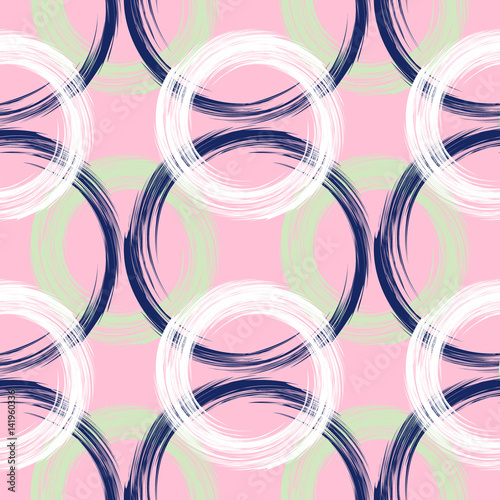 Seamless abstract pattern from green and white round elements on a pink background. Modern pattern for wallpaper or textile.