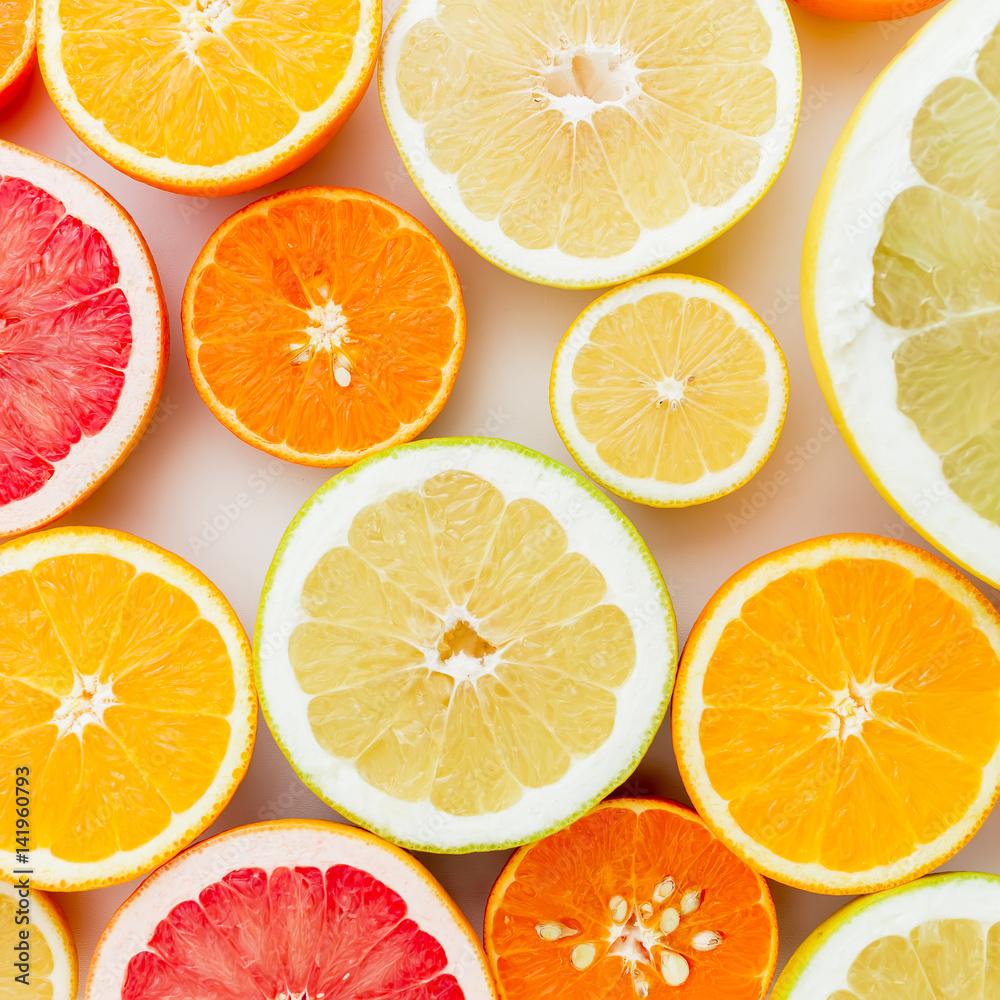 Citrus fruits on white background. Flat lay, top view.