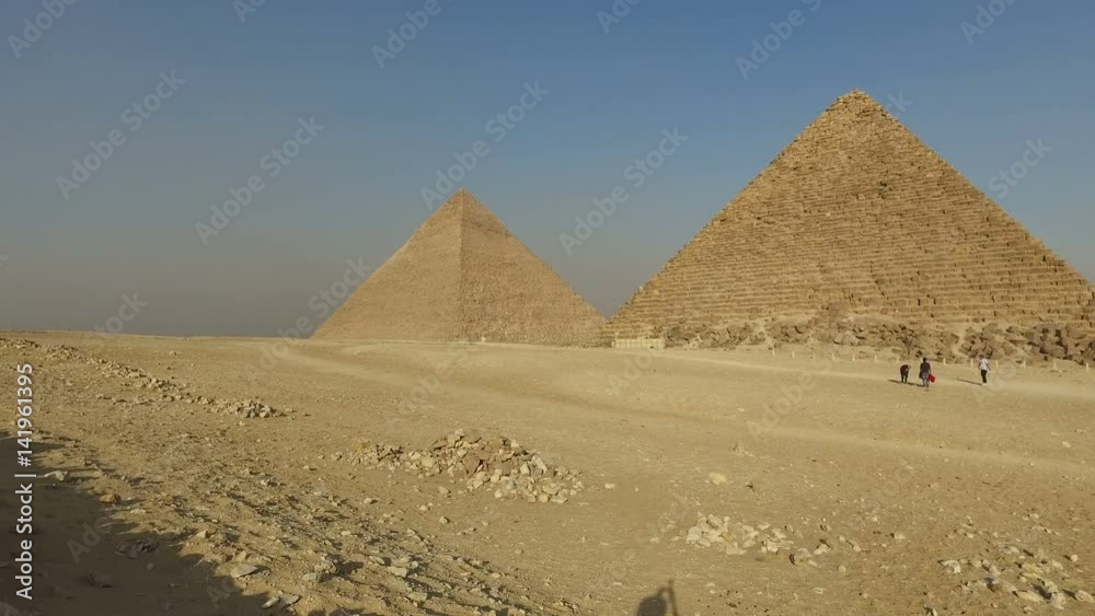 Tourists in front of Menkaure pyramid at Giza, Egypt Tourists in front of Menkaure pyramid at Giza, Egypt