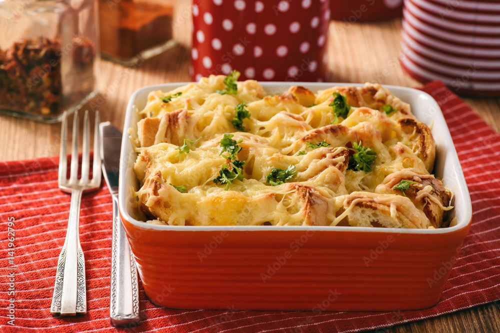 Bread casserole with chicken, spinach,eggs and cheese known as strata ...