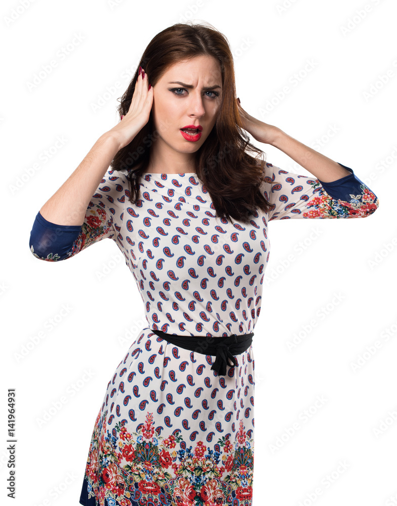 Beautiful young girl covering her ears Beautiful young girl covering her ears