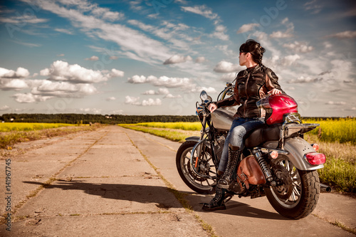 Biker girl on a motorcycle