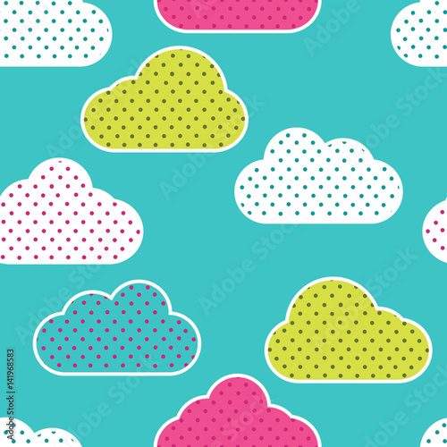 Seamless pattern with colorful clouds silhouettes on green background. Clouds in polka dots