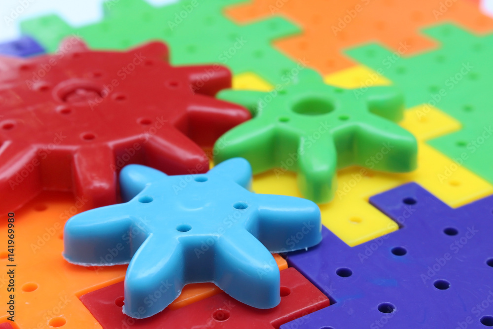Colorful Plastic Cogs / Gears Stock Photo Adobe Stock