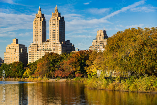 View of Upper West Side buildings and Central Park in Fall. Jacqueline Kennedy Onassis Reservoir, Manhattan, New York City