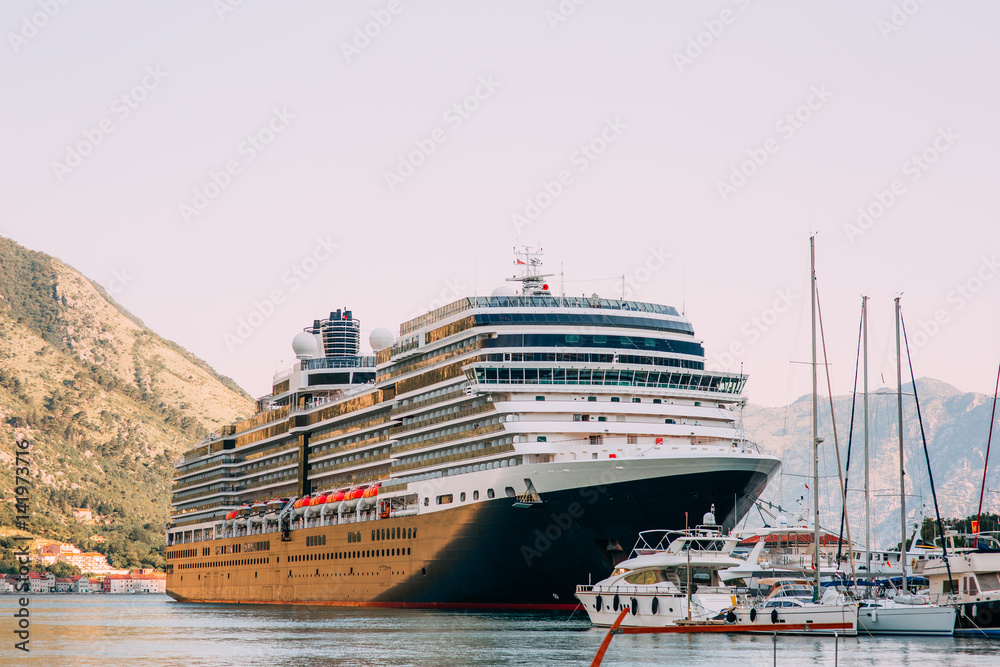 Huge cruise ship in the Bay of Kotor in Montenegro. Near the old town of Kotor. A beautiful country to travel.