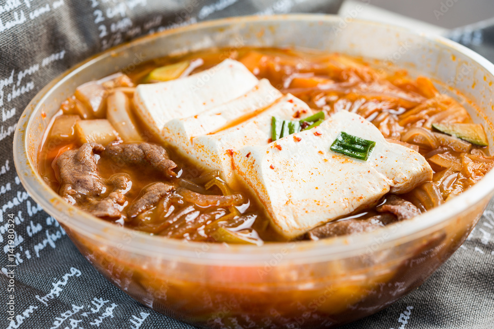 Bowls of Asian soup noodles and vegetables Bowls of Asian soup noodles and vegetables