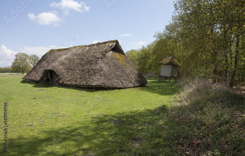 Pre historic farm with reed roof at the peetfields of Drente Netherlands. Near Orvelte Open air museum. Village Orvelte Drente Netherlands. Countrylife. Farm photo