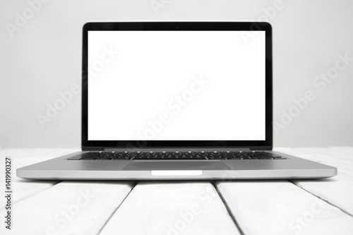 Fototapeta Naklejka Na Ścianę i Meble -  Isolated laptop with empty space on white background