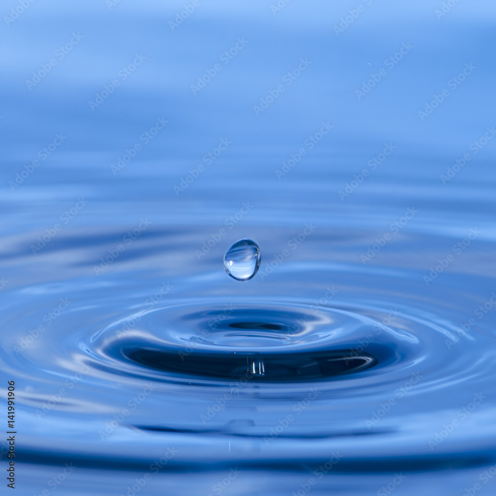 Abstract picture of water splash like crown, Blue background Abstract picture of water splash like crown, Blue background