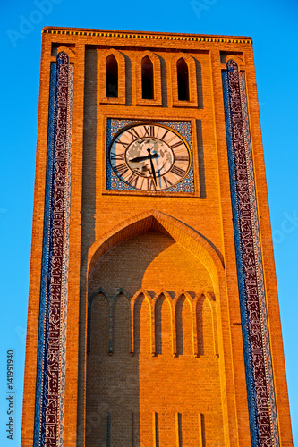 in iran  antique    clock   tower photo