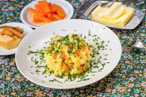 Mashed potato, carrot,parsley, butter.