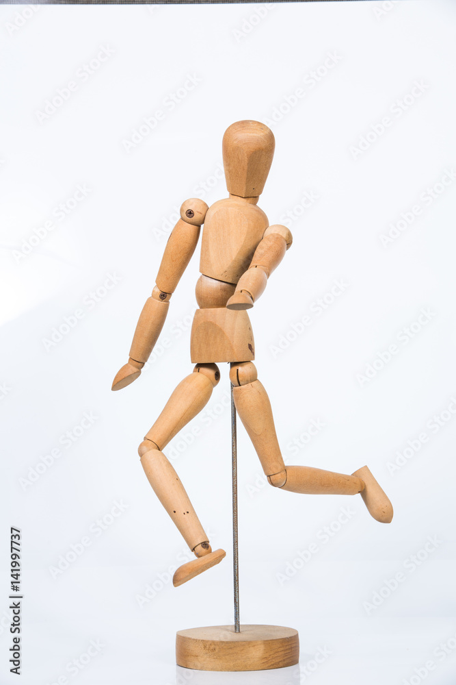 Wooden figure stand isolated on white background Wooden figure stand isolated on white background