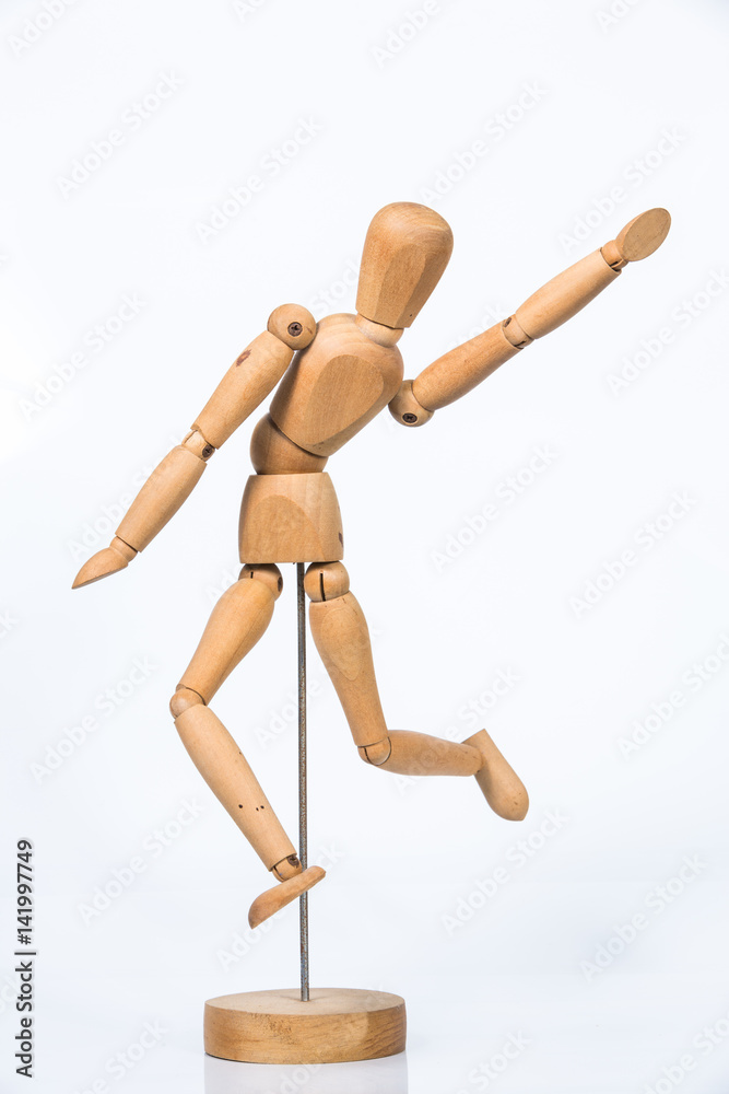 Wooden figure stand isolated on white background Wooden figure stand isolated on white background