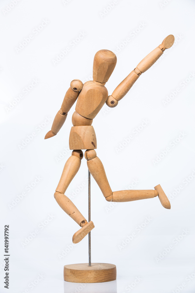 Wooden figure stand isolated on white background Wooden figure stand isolated on white background