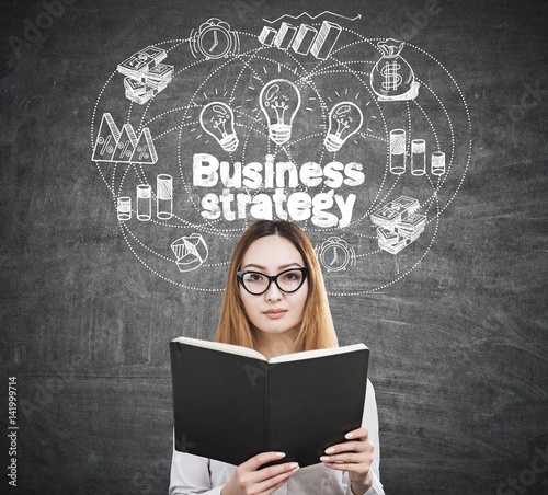 Woman in glasses business strategy