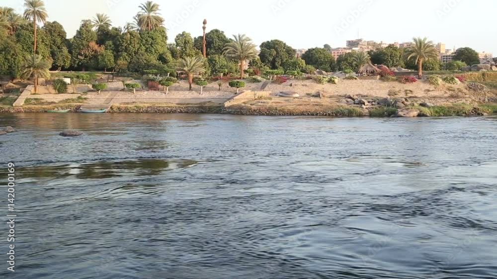 View of beautiful Nile river and coast from a sailboat View of beautiful Nile river and coast from a sailboat