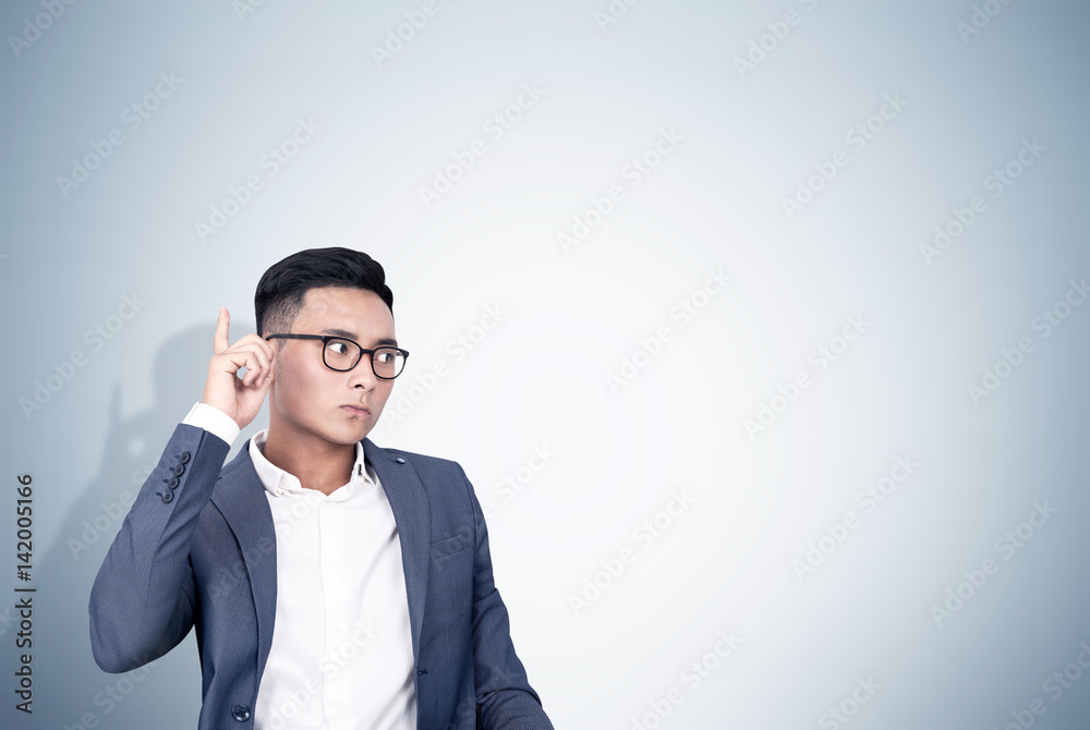 Pensive Asian businessman Pensive Asian businessman