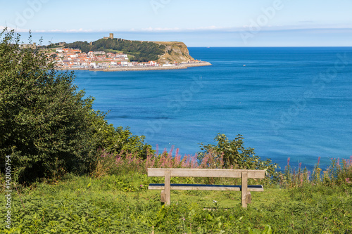 Bench with view towards Scarborough, North Yorkshire, UK photo