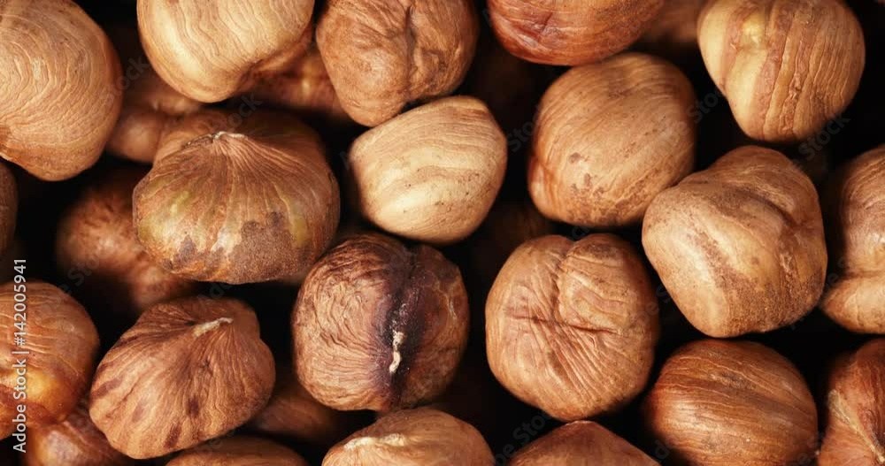 closeup pan of peeled hazelnuts directly from above, 4k prores footage closeup pan of peeled hazelnuts directly from above, 4k prores footage
