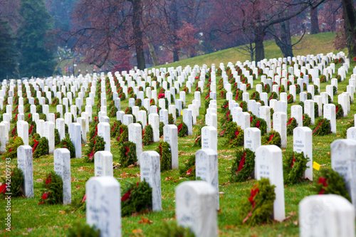 Gravestones with Christmas wreaths in Arlington National Cemetery - Washington DC United States © MISHELLA