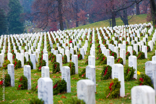 Obraz na płótnie Gravestones with Christmas wreaths in Arlington National Cemetery - Washington DC United States w salonie