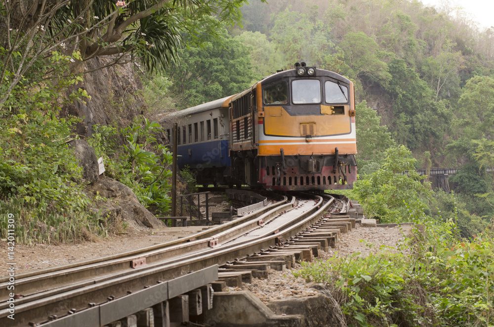 Moving train at death railway, Kanchanaburi, Thailand Moving train at death railway, Kanchanaburi, Thailand