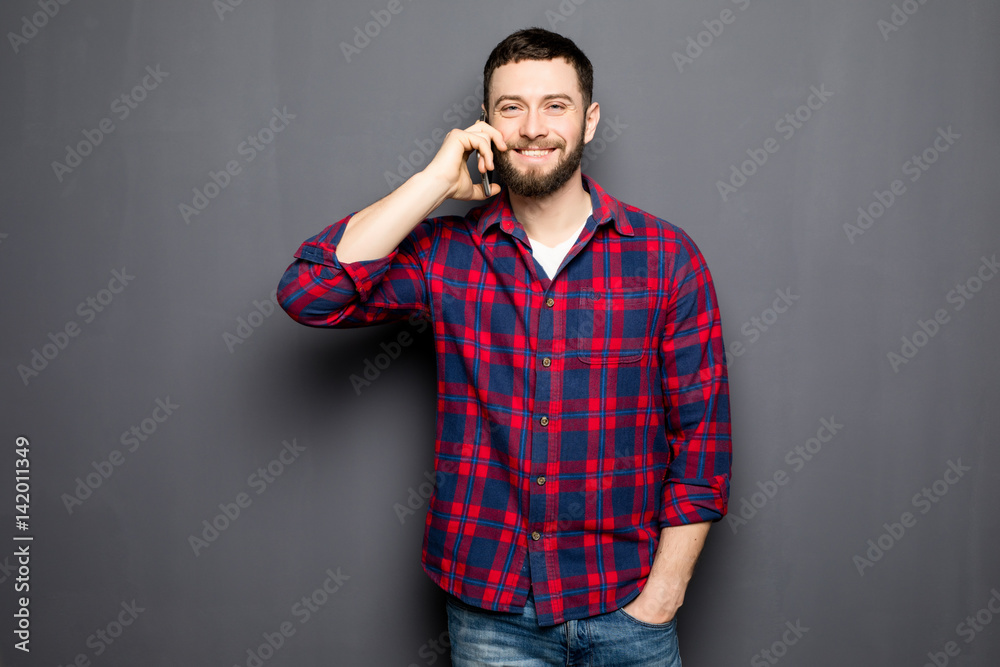 Handsome man speak phone wear shirt jeans Handsome man speak phone wear shirt jeans