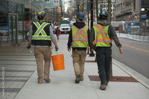 Three males safety jackets Vancouver Canada