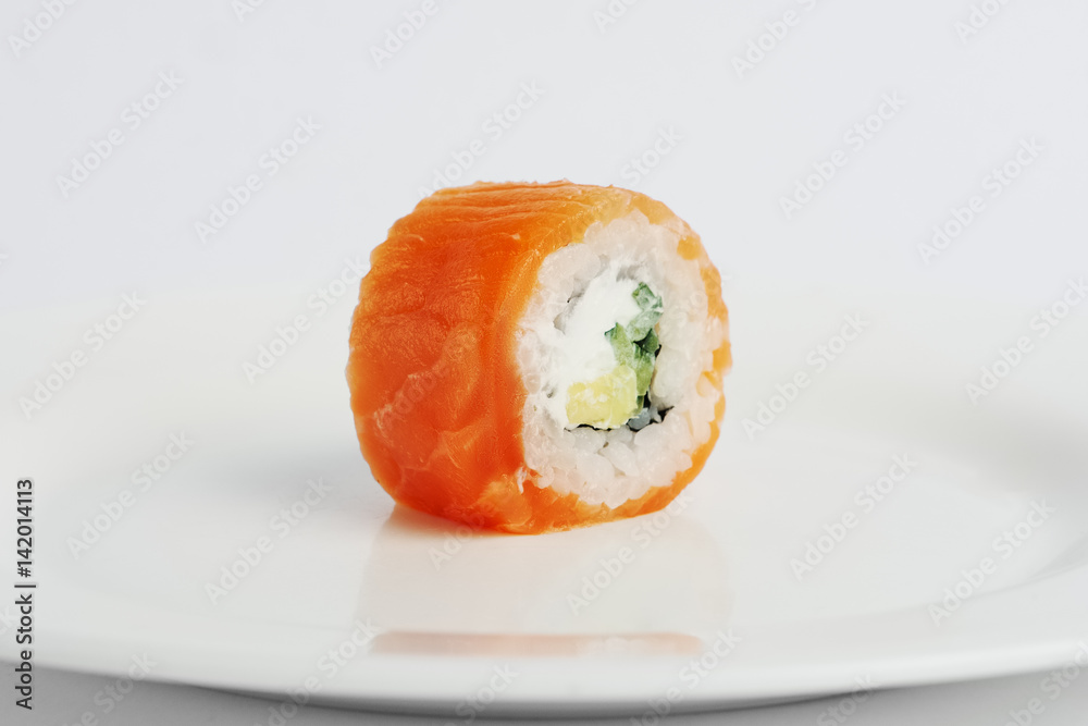 smoked salmon roll with cheese on white background