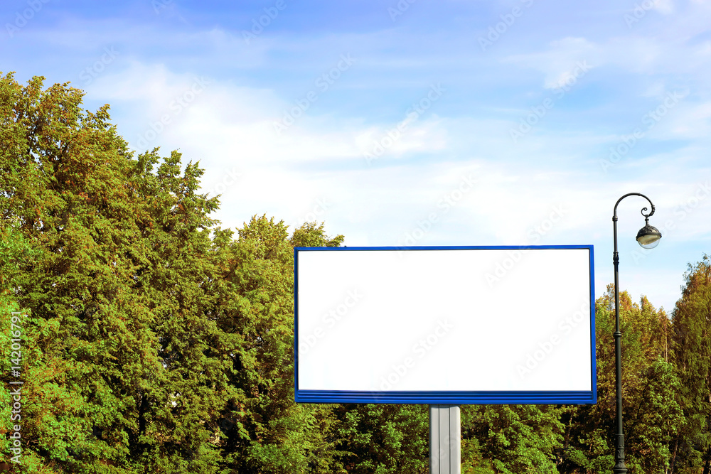Empty billboard against green landscape Empty billboard against green landscape