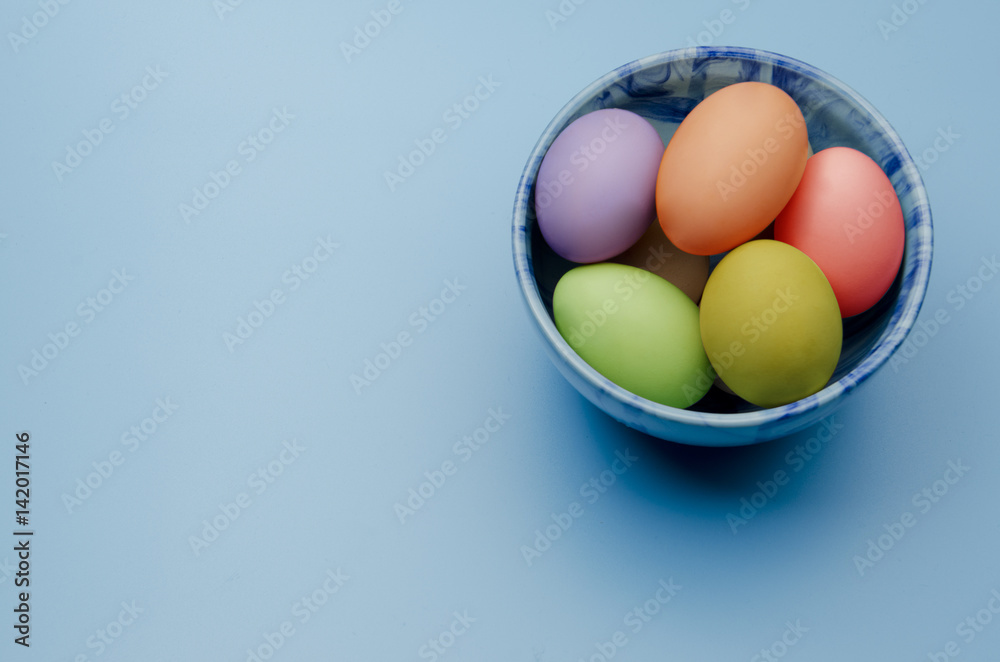 colored easter eggs on a saucer colored easter eggs on a saucer