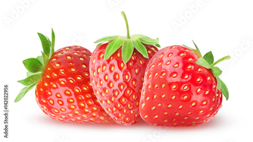 Isolated strawberries. Three strawberry fruits isolated on white background with clipping path