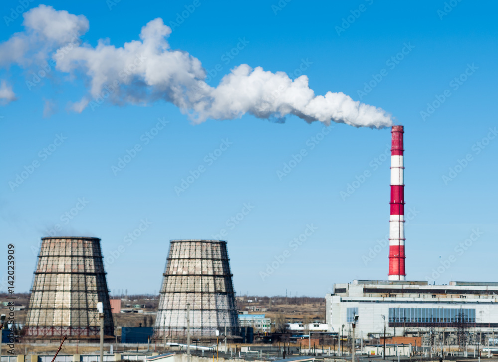 Thermal power station on the outskirts of the city. Industrial landscape. Thermal power station on the outskirts of the city. Industrial landscape.
