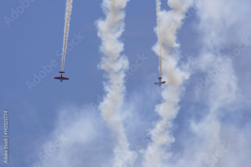 Two planes performing in an air show