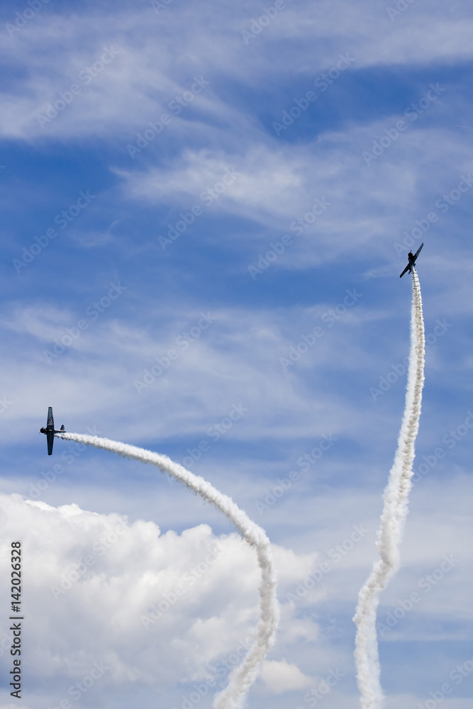Two A plane performing in an air show Two A plane performing in an air show