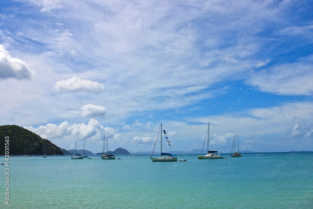 Fototapeta premium Anchoring ships in tropical bay