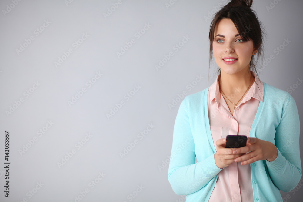 Woman using and reading a smart phone Woman using and reading a smart phone