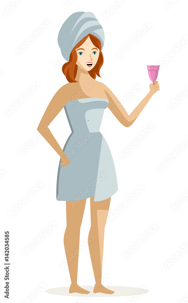 woman holding a menstrual cup after a shower woman holding a menstrual cup after a shower